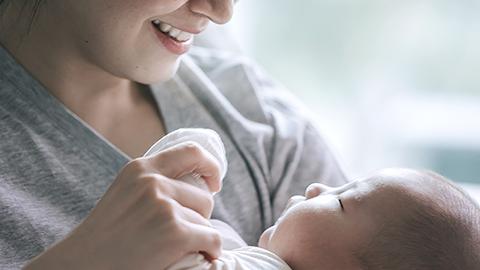 Woman with her new born baby 